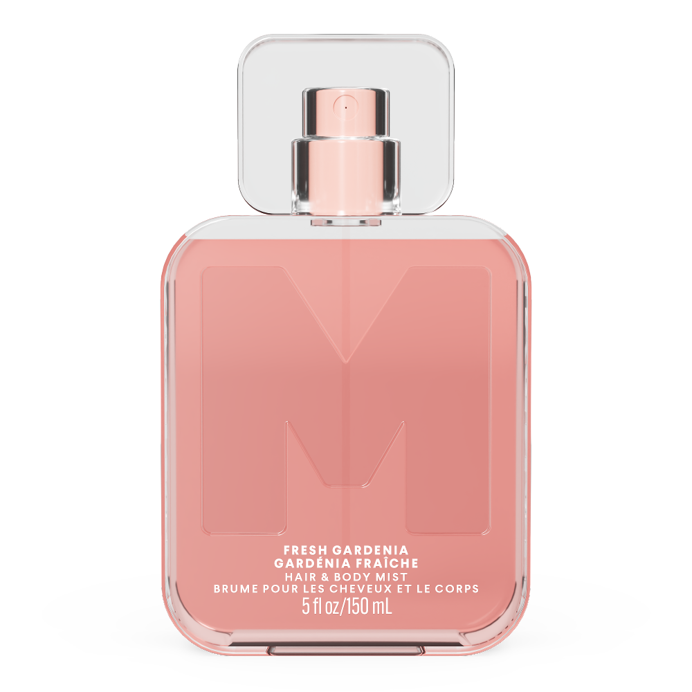 MONDAY Haircare Fresh Gardenia Hair & Body Mist bottle on a pink background.